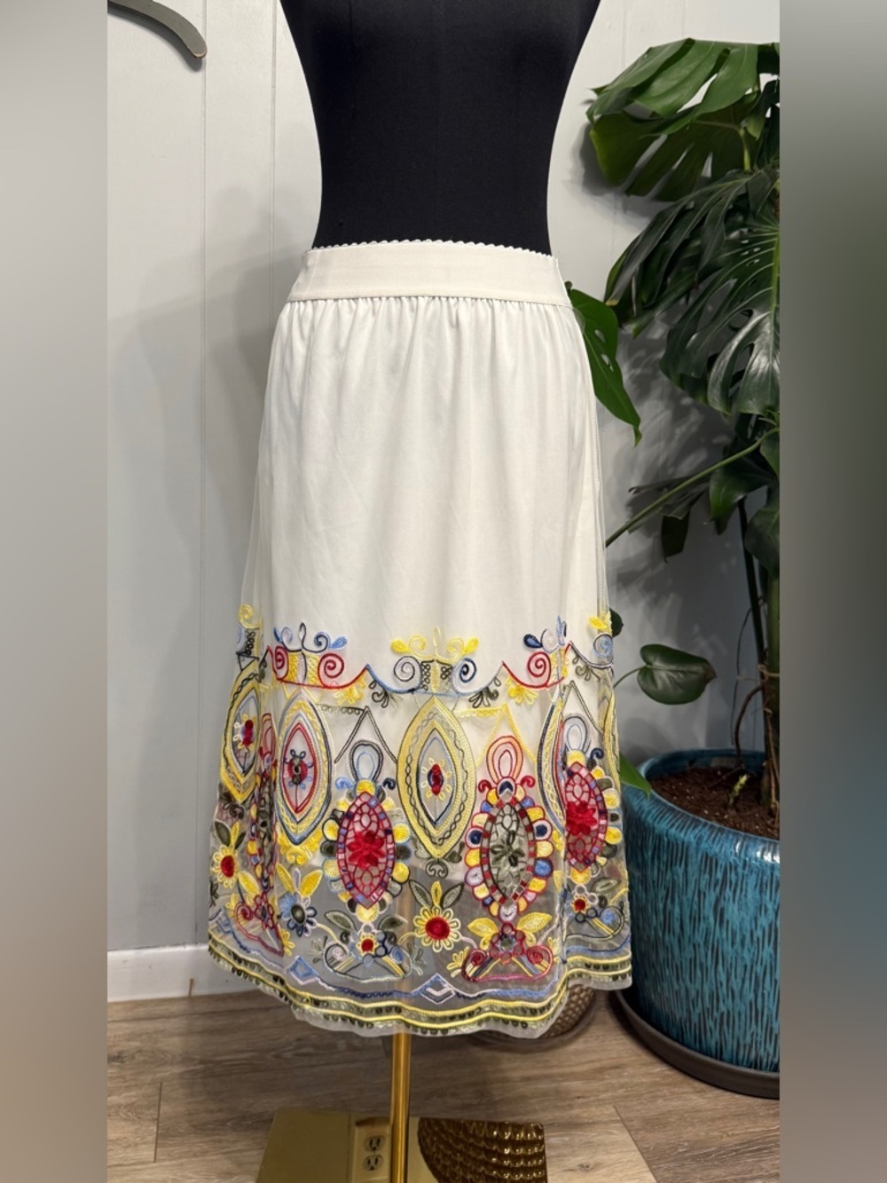 Magic Off-White Midi Skirt with Multicolor Embroidered Hem